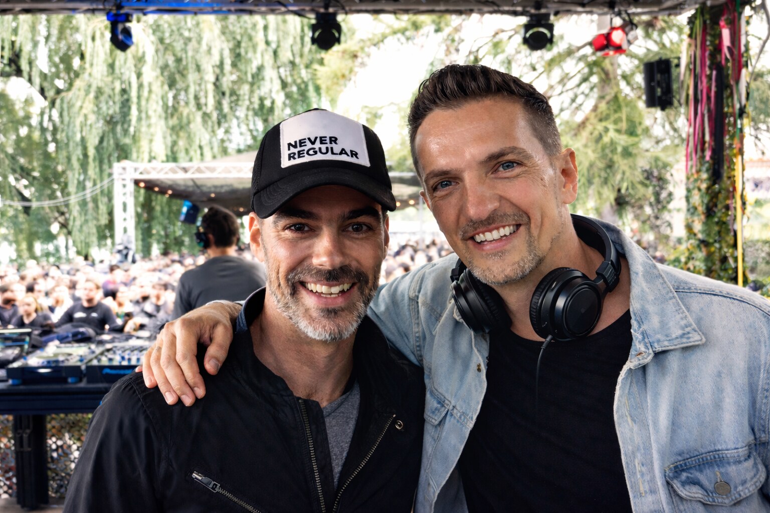 DEEP UNIT playing back to back with a fellow DJ at an open-air event